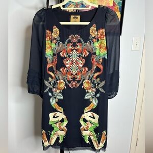 London by Dragons black dress in excellent condition.  Sheer sleeves.